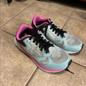 New Balance. Worn just a couple of times